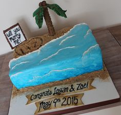 there is a cake that looks like a boat on the beach with a palm tree