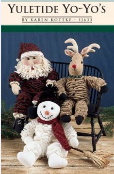 two stuffed animals sitting next to each other on a bench with the caption yuletide yo - yo's