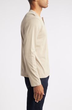 Soft, breathable cotton elevates a versatile henley that's great for layered wear. 100% cotton Machine wash, tumble dry Imported Classic Cotton Relaxed Fit Henley, Classic Cotton Henley With Relaxed Fit, Layering Cotton Tops With Placket, Relaxed Fit Cotton Henley For Layering, Cotton Relaxed Fit Henley For Casual Gatherings, Relaxed Fit Long Sleeve Cotton Polo Shirt, Cotton Relaxed Fit Henley With Henley Neckline, Cotton Henley For Everyday Wear, Classic Long Sleeve Cotton Henley