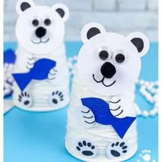 two polar bears made out of toilet paper