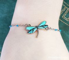 "This listing is for a blue dragonfly charm link bracelet. You can choose either a 6.5\" bracelet or a 7\" bracelet by using the drop-down menu, and both come with a 2\" extender. **Please see the second photo for charm scale. **Please see the second photo for charm scale. If you want a different quantity than you see listed here, just write and ask!  ITEM CARE: We recommend our items never come into contact with moisture, for best results. - - - - - - - Sign up for our newsletter to receive coupons and updates on new items! Follow the link: ♦ ♦ ♦ http://eepurl.com/cG7GGT ♦ ♦ ♦ - - - - - - - If you'd like to add extra charms or birthstones to your item, just follow these links: ♥ EXTRA LETTER CHARMS: https://www.etsy.com/listing/231546815/add-a-letter-charm?ref=pr_shop ♥ EXTRA CRYSTAL BIRT Adjustable Metal Bracelet With Butterfly Charm, Adjustable Metal Bracelets With Butterfly Charm, Adjustable Turquoise Metal Charm Bracelet, Turquoise Metal Charm Bracelet As Gift, Turquoise Metal Charm Bracelet Gift, Blue Hypoallergenic Charm Bracelet For Gift, Hypoallergenic Blue Charm Bracelet Gift, Adjustable Dragonfly Jewelry With Lobster Clasp, Blue Adjustable Charm Bracelet With Lobster Clasp