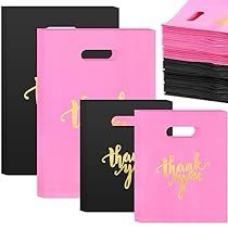 pink and black thank you bags with gold foil lettering on the front, one for each