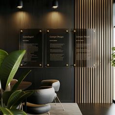 an office with black walls and wooden paneling, two chairs are facing each other