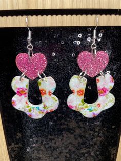 Floral printed acrylic earrings. Handmade White Plastic Earrings, White Plastic Earrings For Parties, Handmade Pink Plastic Earrings, Multicolor Plastic Earrings As Gift, Multicolor Plastic Earrings For Party, Cute Multicolor Plastic Earrings, Multicolor Dangle Earrings In Plastic, Gift Floral Print Multicolor Earrings, Multicolor Plastic Dangle Earrings