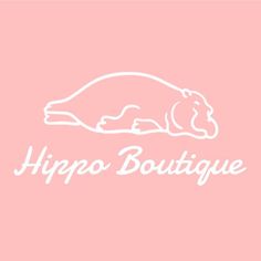 the hippo boutique logo is shown on a pale pink background with white lettering that reads,