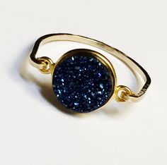 Druzy Ring has a beautifully cut cabochon blue druzy gemstone wrapped in 14k gold filled wire. This Blue Druzy gemstone ring is designed to shine! Blue Druzy gemstone bezel is 8-10mm diameter size in this gold filled ring. Due to the natural formation of these druzy gemstones no two are alike and each gemstone may vary in size, shape and texture to give that natural organic look and will not look exactly like the gemstone pictured. You are not purchasing the exact stone in the picture. Ring size Picture Ring, Bezel Ring, Gold Filled Ring, Ring Blue, Threader Earrings, Body Piercing Jewelry, Blue Rings, Ring Gold, Natural Organic