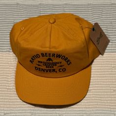 Ratio Beerworks Hat From Denver Colorado Yellow Curved Brim Baseball Cap For Summer, Yellow Flat Brim Snapback Hat For Summer, Yellow Snapback Hat With Flat Bill For Outdoor, Yellow Baseball Cap With Curved Brim, Yellow Flat Bill Snapback Hat For Outdoor, Casual Yellow Trucker Hat With Short Brim, Yellow Adjustable Flat Bill Snapback Hat, Yellow Flat Bill Hat, One Size Fits Most, Yellow Flat Bill Hat