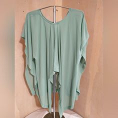 Off-White Flowy Sheer Blouse Light Green Flowy Sheer Blouse Selling Both Blouses Together Size Medium New With Tags! 2 For The Price Of 1 Lightweight Flowy Batwing Sleeve Top For Day Out, Flowy Short Sleeve Tops For Party, Drapey Summer Party Top, Summer Batwing Sleeve Drapey Top, Summer Drapey Top With Batwing Sleeves, Summer Drapey Batwing Sleeve Tops, Green Batwing Sleeve Blouse, Casual Drapey Top With Batwing Sleeves, Summer Stretch Blouse With Batwing Sleeve