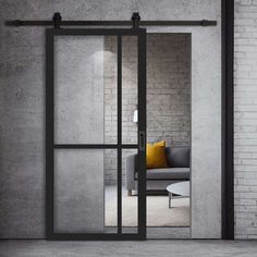 an open glass sliding door in a room with brick wall and white carpeted floor