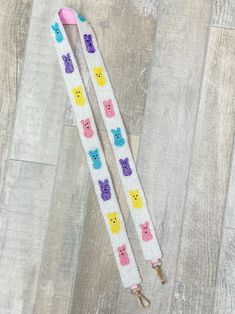 Upgrade your accessory game with this versatile bag strap that will elevate your Spring look! Trendy Lanyards With Key Leash For Everyday Use, Trendy Adjustable Rectangular Bag Strap, Trendy Adjustable Bag Strap For School, Trendy Multicolor Lanyards For Everyday Use, Adjustable Rectangular Bag Strap With Key Leash, Adjustable Rectangular Lanyards For Everyday Use, Trendy Rectangular Bag Strap For School, Trendy Adjustable Multicolor Shoulder Strap, Trendy Adjustable Bag Strap