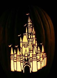 a pumpkin carved to look like a castle