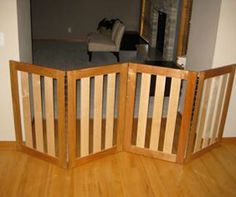 a room divider made out of wood with a dog in the background