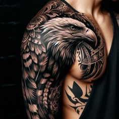 a man with an eagle tattoo on his arm and chest is wearing a black tank top