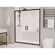 an image of a bathroom setting with white and black decor on the walls, toilet and shower