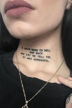 a woman with tattoos on her neck is wearing a necklace that reads i have been to hell and let me tell you it was wonderful