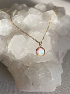 Elevate your look with our stunning White Halo Kyocera Opal Necklace! This ethereal piece features a mesmerizing opal stone that will surely turn heads. Perfect for any occasion! Nickel & Lead free14k Gold Plated Pendant & 18" L Gold Plated Chain Opal Stone, Opal Necklace, White Opal, Elevate Your Look, Gold Plated Chains, Opal Jewelry, Halo, Opal, Gold Plate