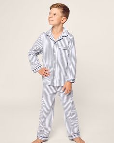 These elegant pajamas were made in a traditional French ticking design. This classic pattern is here to stay, with no frills just clean, crisp lines. This classic pajama set is accented with navy piping and finished with pearl buttons. The sleepwear is made from the finest quality yarn-dyed cotton and blended with just enough inherently flame retardant fiber to allow it to pass strict CPSC flame retardant laws without using harmful chemicals. The fabric is brushed for added softness, making the Classic White Sleepwear For Pajama Party, Navy Cotton Loungewear Sets, Classic Long Sleeve Pajama Party Sets, Classic Cotton Sleepwear For Pajama Party, Classic Relaxed Fit Loungewear Sets, Classic White Cotton Sleepwear, Classic Long Sleeve Sleep Sets, Classic Relaxed Fit Pajama Party Sets, Classic Cotton Long Sleeve Sleepwear