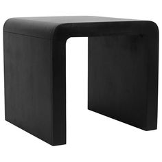 a black table with a curved design on it