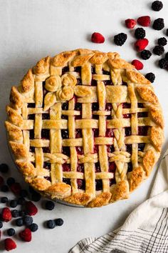 an image of a pie with berries on the side