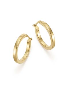 Always in style, these exclusive square-edge hoop earrings gleam in 14K yellow gold. Luxury Yellow Gold Hoop Earrings With Shiny Finish, Luxury Everyday Timeless Yellow Gold Hoop Earrings, Luxury Shiny Finish Huggie Earrings For Formal Occasions, Luxury Shiny Finish Hoop Earrings For Formal Occasions, Luxury Shiny Huggie Earrings For Formal Occasions, Classic Rectangular Hoop Earrings For Anniversary, Timeless Yellow Gold Hoop Earrings With Shiny Finish, Timeless Yellow Gold Hoop Earrings For Anniversary, Rectangular Yellow Gold Hoop Earrings For Anniversary