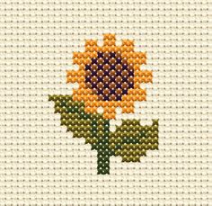 a cross stitch pattern with a sunflower on it