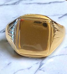 Antique 10k Yellow Gold SQUARE Face SIGNET Ring ENGRAVABLE Size 9 Really beautiful and very unique antique 10k yellow gold Signet ring! * Freshly polished up beautifully by my jeweler it's ready for you to wear! * Size 9 * Weighs 3.9 grams  Please message me with any questions!  Shipped FAST AND FREE, fully insured and gift boxed :) I guarantee item to be exactly as described and pictured. Victorian Style Yellow Gold Signet Ring With Polished Finish, Heirloom Gold Signet Ring With Polished Finish, Victorian Style 14k Yellow Gold Signet Ring, Heirloom Gold Signet Ring, Gold Signet Ring With Polished Finish For Collectors, Classic Square Cut Signet Ring For Anniversary, Collectible 14k Yellow Gold Signet Ring, Art Deco Rectangular Signet Ring With Polished Finish, Rectangular Shaped Gold Jewelry In Fine Jewelry Style