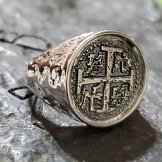 This coin ring has a very rich and beautiful finish.  It's solid sterling silver, and the coins themselves are made from the silver bars recovered from the Atocha and comes with a certificate stating that. I also sign my name on the back so you know you are getting a JackSpirit original design. Treasure Coin, Key West Fl, Coin Ring, Gold Overlay, Silver Bars, Men's Ring, Key West, Sign I, 14kt Gold