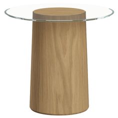 a round glass table with wooden base