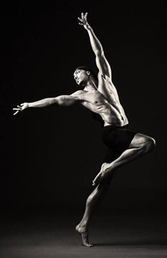 a male ballet dancer in black and white