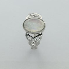 These is a beautiful pair of Sterling Silver Ring with a Rainbow Moonstone Gemstone. The ring are made out of solid 925 Silver and there is no nickel or other substances causing most allergies. This makes the ring hypo allergenic. Size of the Moonstone 1.2 x 0.8 cm or 0.47 x 0.31 inch You will receive the item in a gift box - perfect to surprise someone or yourself. Usually we ship on the same day we receive the payment for the order. We want you to be happy with your purchase. If you do not lik Silver Crystal Birthstone Ring, Silver Mystical Crystal Birthstone Ring, Silver Mystical Crystal Ring For Anniversary, Mystical Silver Crystal Ring For Anniversary, Mystical Silver Opal Ring For Anniversary, Silver Spiritual Opal Birthstone Ring, Spiritual Silver Opal Ring Birthstone, Mystical Cabochon Jewelry For Anniversary, Mystical Sterling Silver Opal Promise Ring