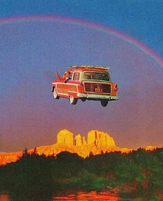 a van is flying over the water with a rainbow in the sky and mountains behind it