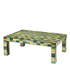 a coffee table made out of multicolored tiles on top of a white background