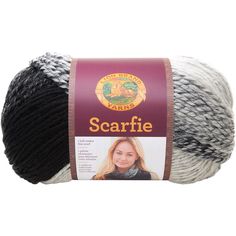 a skein of yarn with the words scarfie written in white and black