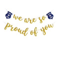 a banner that says we are so proud of you in gold foil lettering on a white background