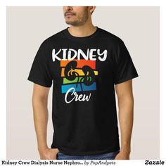 a man wearing a black t - shirt with the words kidney crew printed on it