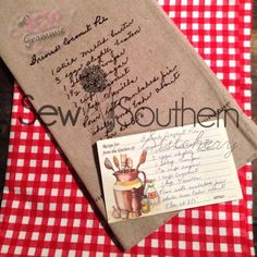 an old fashioned recipe book with writing on it and a note attached to the cover