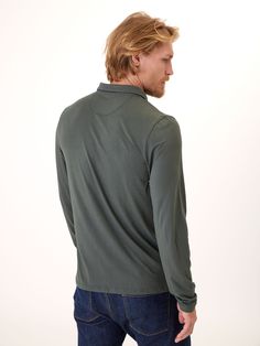 Introducing Luxe Jersey Long Sleeve Polo: crafted with an ultra-stretchy, luxe jersey fabric for uncompromising comfort and style. The classic polo style pairs easily with any pant an effortless yet sophisticated look. Jersey Long Sleeve, Sophisticated Look, Polo Style, Long Sleeve Polo, Heather Black, Trending Now, V Neck Tee, Fleece Hoodie, Jersey Fabric