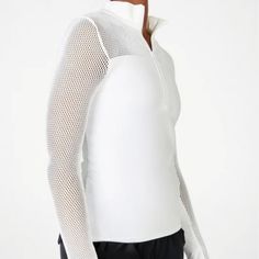 Made From Breathable Sculptknit Fabric, This Fitted Top Features Mesh On The Back, Sleeves, And Shoulders For Max Ventilation While Still Keeping You Covered. Features Breathable Moisture-Wicking Sporty Stretch Winter Tops, White High Stretch Long Sleeve Top, Stretch Tops For Winter Workout, White Stretch Winter Tops, Stretch Knit Tops With Ribbed Cuffs, Fitted Sportswear Tops For Winter, Snug Fit Sports Tops For Winter, Fitted Winter Sportswear Tops, Winter Fitted Sportswear Tops