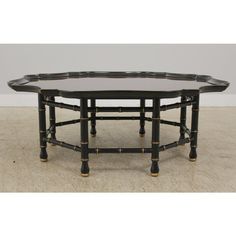 a round table with black and gold trimmings