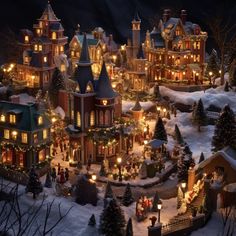 a christmas village with lit up houses and trees