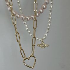 We found the link to our heart -and it’s this necklace! With its adorable heart linked, this necklace is so powerful it's guaranteed to find its way into your life. Wanna feel the love? Pair it with Loved One Necklace for the most wholesome stack. Valentine's Day Heart Pendant Paperclip Chain Jewelry, Trendy Heart Charm Chain Necklace As Gift, Trendy Chain Necklace With Heart Charm As Gift, Mother's Day Heart Necklace With Chain, Trendy Heart Necklace With Chain, Valentine's Day Jewelry Pendant With Paperclip Chain, Valentine's Day Pendant Jewelry With Paperclip Chain, Valentine's Day Paperclip Chain Pendant Jewelry, Valentine's Day Heart-shaped Paperclip Chain Jewelry