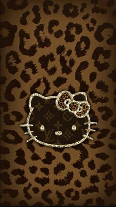 an animal print with a hello kitty patch on it