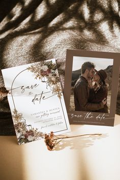 an image of a couple in love on their wedding day with save the date cards