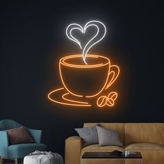 a coffee cup with a heart on it is lit up by neon lights in the dark