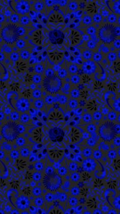 a blue and black background with flowers