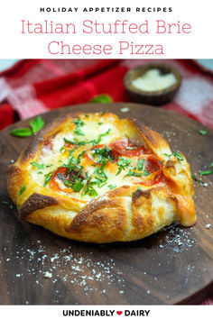 a pizza sitting on top of a wooden cutting board