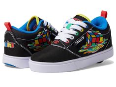 Heelys Pro 20 Rubiks (Little Kid/Big Kid/Adult) - Kids Shoes : Black/Red/Blue : All Heelys styles come equipped with removable wheels, making them a versatile footwear option for every step from the classroom to the coffee shop. , Get ready to roll in style choosing the Heelys Pro 20 Rubiks sneakers! These cool kicks feature canvas upper with multicolor eye-catching print that is sure to turn heads. The textile lining and removable cushioned EVA insole provide comfort, while the low-top silhouette gives you the support you need to skate or walk in style. Lace-up closure. Pull tab on the back. Branding on the back heel tab. Round toe design. Rubber outsole. Imported. Measurements: Weight: 10 oz Product measurements were taken using size 13 Little Kid, width M. Please note that measurements Running Images, Bedside Cabinet, Kids Luggage, Toe Designs, Big Kid, Pull Tab, Shoes Black, Big Kids