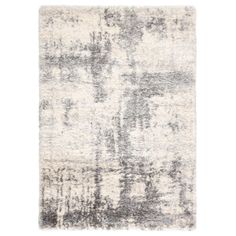 an abstract rug with grey and white colors