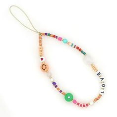 1. This vibrant beaded phone chain features a cheerful happy face design, adding a pop of color and personality to your phone. 2. Handmade with love, this whimsical phone strap is adorned with colorful beads that are sure to put a smile on your face every time you use it. 3. Make a statement with this unique phone charm, featuring a playful happy face design that will brighten up your day. 4. Add a touch of fun to your phone with this eye-catching accessory that doubles as a stylish way to keep Phone Bracelet, Strap Phone, Phone Chain, Phone Strap, Phone Grips, Face Design, Happy Face, Phone Charm, Handmade Accessories