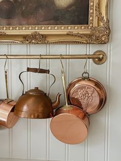 Copper Display Kitchen, Copper Pan Display, Copper Pot Display, Vintage Accordian Peg Rack Decor, Copper Pots And Pans Display, Hanging Copper Pots, Bookshelf Wealth, Copper Pans Hanging, Copper Pots Display